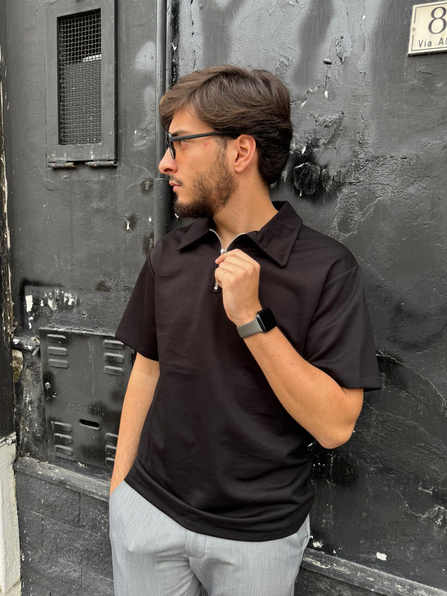 Polo con zip nero